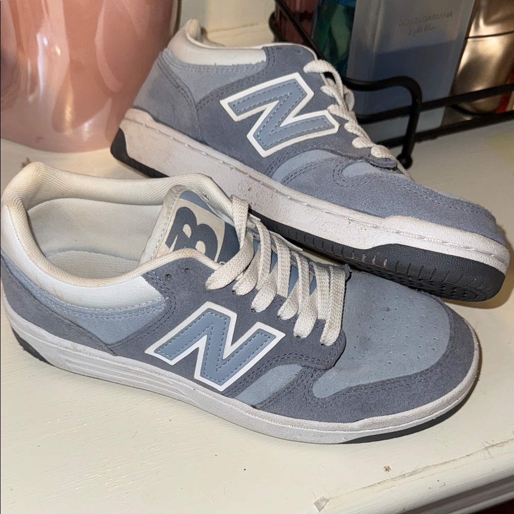 New Balance Men’s Arctic Grey/ Light Arctic (blue) and White Sneakers.
